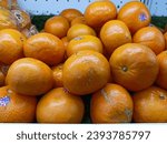 Small photo of Super Top Swalayan Kota Pare, Kediri, East Java, Indonesia - November 26, 2023: Satsuma Mandarin or Fresh Mandarin Oranges in Super Top Swalayan Kota Pare, Kediri