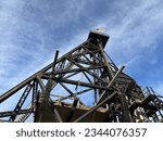 Small photo of "gallows frames", "gallus frames", or headframes, these mark the remnants of mines that honeycombed the Butte hill.