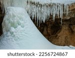 The bottom of an icefall is framed by a curtain of icicles.  Kaskaskia Canyon, Starved Rock State Park, LaSalle County, Illinois