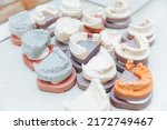 Small photo of A cast of teeth. Plaster model of plaster of teeth. Dental plaster cast, casts of human jaws and teeth. The concept of dentistry and orthodontics.