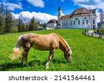 Small photo of Vacation in Bavaria: Wieskirche near Steingaden with horses - pilgrimage church to the Scourged Savior on the Wies