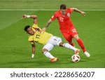 Small photo of Moscow, Russia – July 3, 2018. England national football team right-back Kieran Trippier and Colombia winger Johan Mojica during World Cup 2018 Round of 16 match Colombia vs England (1-1)