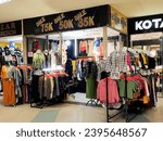 Small photo of Surabaya - Indonesia, November 28, 2023 A women's clothing store that is organized to attract and facilitate visitors to choose clothes.