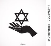hand holding a star of david | Shutterstock .eps vector #720896944