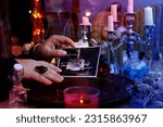 Small photo of spiritualistic seance in salon of medium with old photographs of deceased relatives, Female Fortuneteller or esoteric Oracle, longing for ancestors, communication with world spirits, help of ancestors