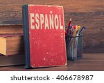 learn spanish concept. book on a wooden background