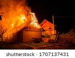 Wooden House Or Barn Burning On ...