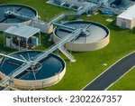 Small photo of Aerial view of water treatment factory at city wastewater cleaning facility. Purification process of removing undesirable chemicals, suspended solids and gases from contaminated liquid