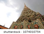 Small photo of Pagoda in dark day. Thailand. Generally in Thailand , any kinds of art decorated in Buddhist church, temple pavilion. temple hall, monk’s house etc.They are public domain or treasure of Buddhi