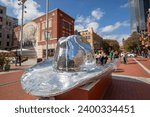Small photo of Fort Worth, Texas - November 4, 2023: The Disco Cowboy Hat in Sundance Plaza in Fort Worth at Main street.