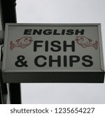 Small photo of Sign for "English Fish & Chips" on Kearsley Road, Kearsley, Manchester, England, Europe on Tuesday, 20th, November, 2018