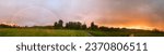 Small photo of Everett, Washington, USA - June 3, 2022: Beautiful panoramic photo of a rainbow sunset at a park in Everett.