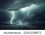 Thunderstorm on the road digital art. Lightning, thunder and rain on asphalt road. Grey clouds, dark stormy weather