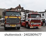 Small photo of Hilversum, the Netherlands - June 5, 2022: vintage Mack and Scania trucks on display