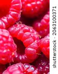 macro of ripe red raspberry.... | Shutterstock . vector #2063100371