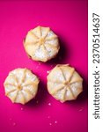 Small photo of commecial photos of Viennese Whirls and Bakewell tarts on metal tray and with coloured backgrounds