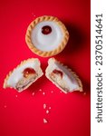 Small photo of commecial photos of Viennese Whirls and Bakewell tarts on metal tray and with coloured backgrounds