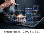 Analyst working with computer in Business Analytics and Data Management System to make report with KPI and metrics connected to database. Corporate strategy for finance, operations, sales, marketing.