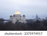 Small photo of Nativity of Christ Cathedral in Riga, Latvia. Riga Cityscape in grey foggy autumn day. Landmark In Latvia in Evening. Golden Yellow Domes. Captured from above