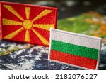 Flags of Bulgaria and North Macedonia straight in front of each other, The concept of complicated relations between the two countries