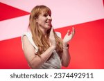 Small photo of Liverpool, United Kingdom - October 9 2023: Labour Party Conference. Deputy Leader of the Opposition Angela Rayner applauded the Shadow Chancellor of the Exchequer, Rachels Reeves' speech.