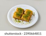 Small photo of Turkish Dessert Sobiyet Baklava, mussels baklava and classic baklava with Pistachio . Cevizli, Fistikli Baklava, top view.
