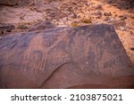 Ancient Petroglyphs On A Cave...