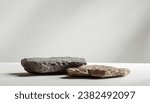 Small photo of product display podium Rock Stone with blurred background with sunlight shadow
