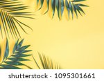 Tropical Palm Leaves On Yellow...