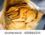 Potato chips is snack in bag ready to eat and fat food or junk food., Potato Chips in a Ready-to-Eat Bag.