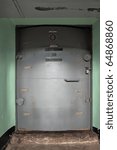Small photo of The big heavy steel door in a bombproof shelter