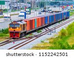 Small photo of Container Freight Train with running through the industrial district, the harbor.