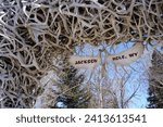 Antlers Arch with sign welcoming people to Jackson Hole, Wyoming, United States