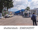 Small photo of Thessaloniki, Greece - September 9 2023: Visitors outside pavilions of the 87th TIF International fair, taking place from 09 to 17 September 2023.