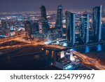 Small photo of Manama, Bahrain - Night cityscape view of Manama Skyline dominating Bahrain Financial Harbour taken on January 01, 2022