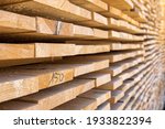 Small photo of Stack wooden studs, industrial wood lumber wood textures.