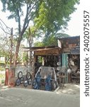 Small photo of Penggaron Semarang 16 December 2023, Mr. Benny's kiosk selling wheels for carts, trolleys and other means of transporting goods