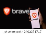 Small photo of Dhaka, Bangladesh - 21 December 2023 :Brave browser logo on smartphone,Brave is a free,open-source wab browser.