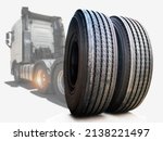 Big Rig Semi Truck Wheels Tires on White Background. Lorry Tyres Rubber. Freight Trucks Transport. Auto Service Shop	
