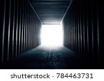 Abstract dark background. empty inside cargo container truck with blank white light outside.