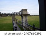 Small photo of Whidbey Island, WA USA November 20 2018: unidentified man on tower of Fort Casey on Whidbey Island, Washington