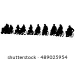 silhouettes wheelchair and... | Shutterstock .eps vector #489025954