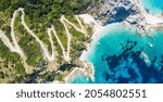 Small photo of Aerial view Agia Eleni beach in Kefalonia Island, Greece. Remote beautiful rocky beach with clear emerald water and high white cliffs
