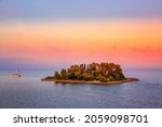 Pontikonisi Mouse Island during sunset. Corfu island, Greece.