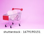 shopping cart and pink heart on ... | Shutterstock . vector #1679190151