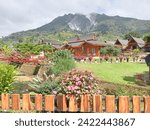 Small photo of creative layout of the beauty of Mount Sibayak as seen from the natural tourist attraction Pariban Berastagi hot springs, Tanah Karo, North Sumatra