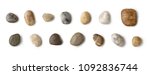 Stones collection. Different kind of pebbles stones with a soft shadow against white background.