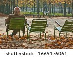  Ld Man Sitting Alone On Park...