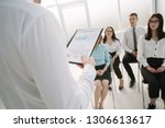 senior manager makes a report... | Shutterstock . vector #1306613617