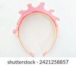 Pink and white women's headband ...